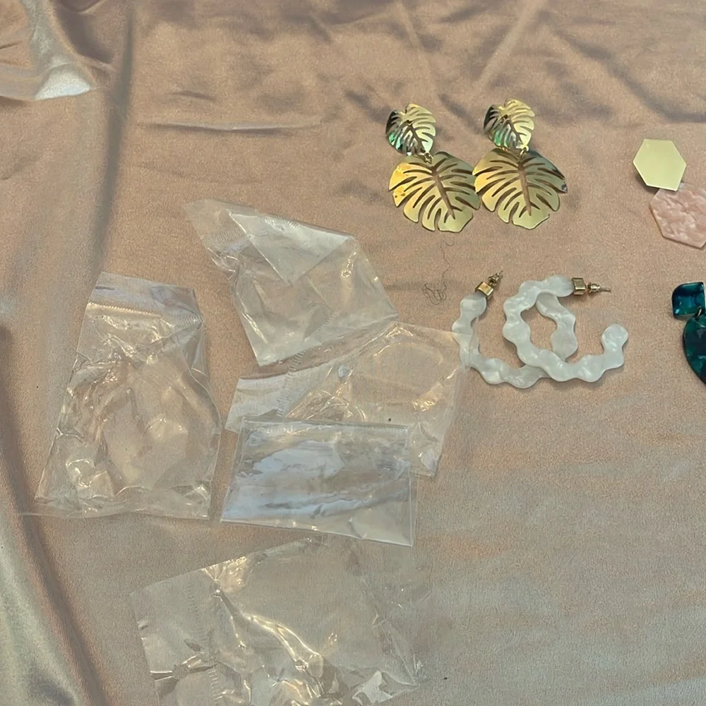 Five pairs of brand new lightweight earrings. Costume fun jewelry